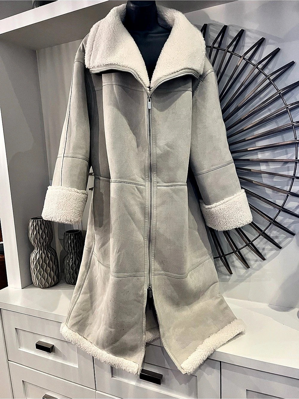 Shearling Coat in light grey with cream lining and trims
Size Medium